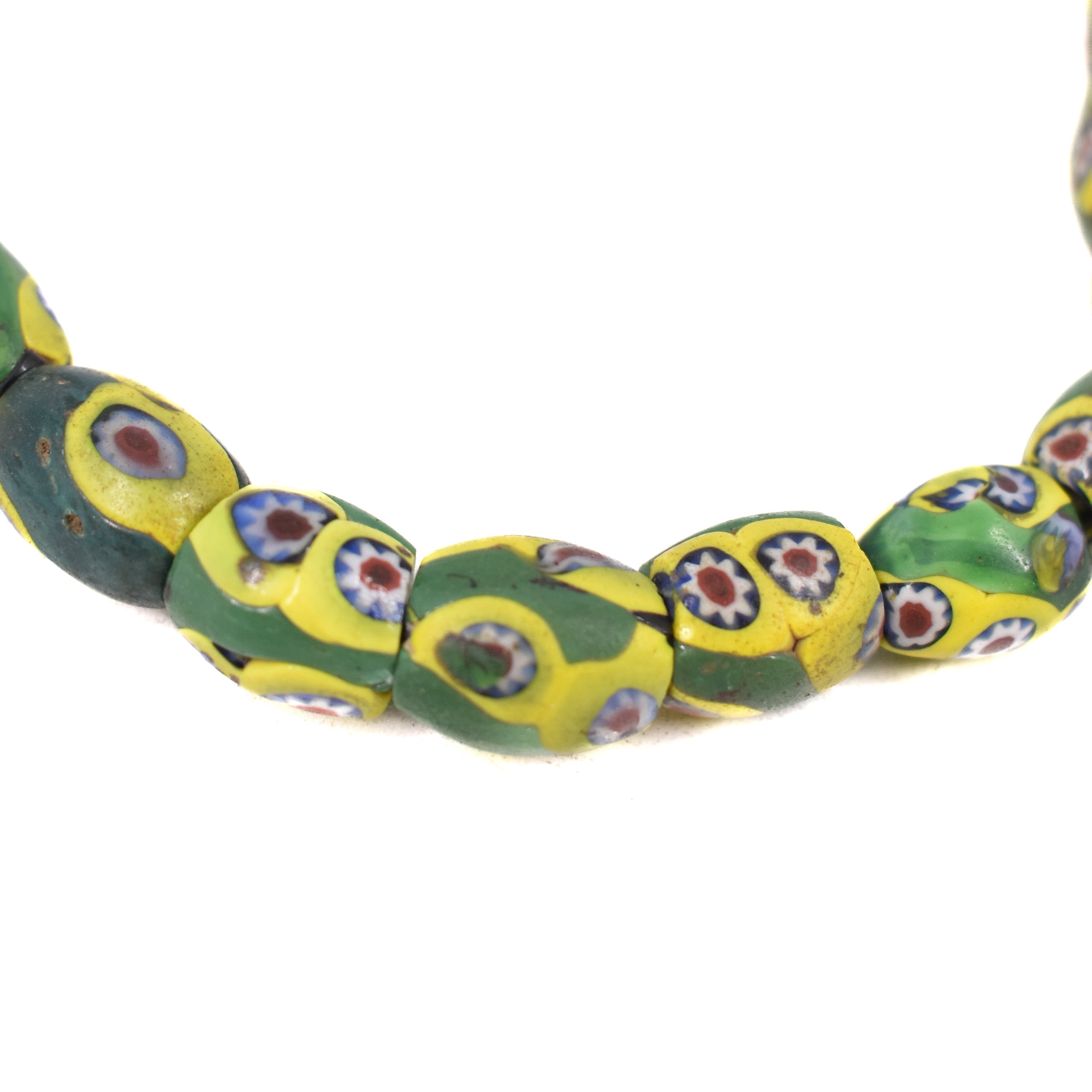 Unique creation composed of ancient high quality Venetian millefiori pearls from the 19th century and bronze from Côte d'Ivoire.