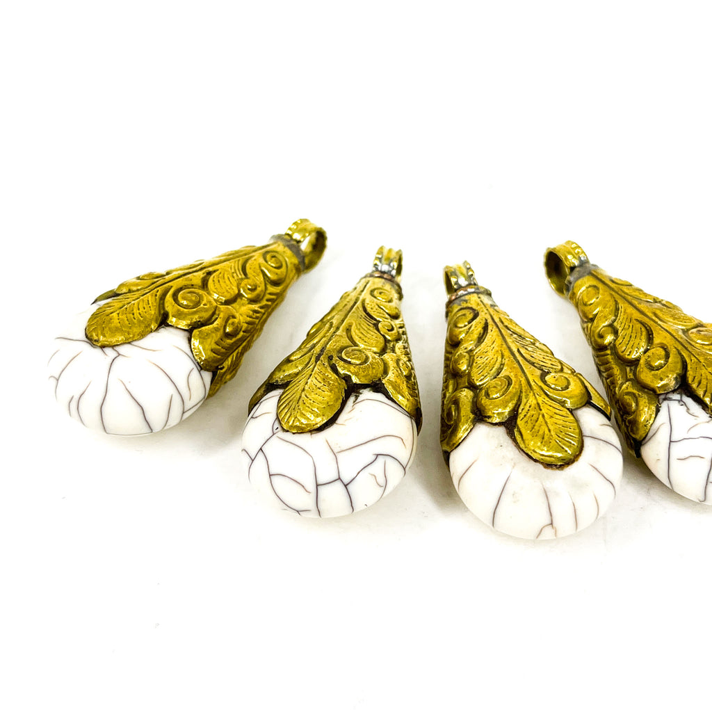 4 Loose Tibetan White Crackle Pendants with Gold Repoussé