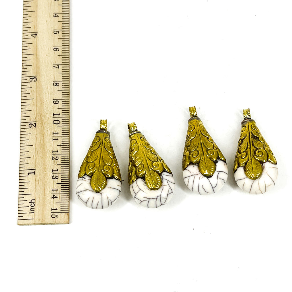 4 Loose Tibetan White Crackle Pendants with Gold Repoussé