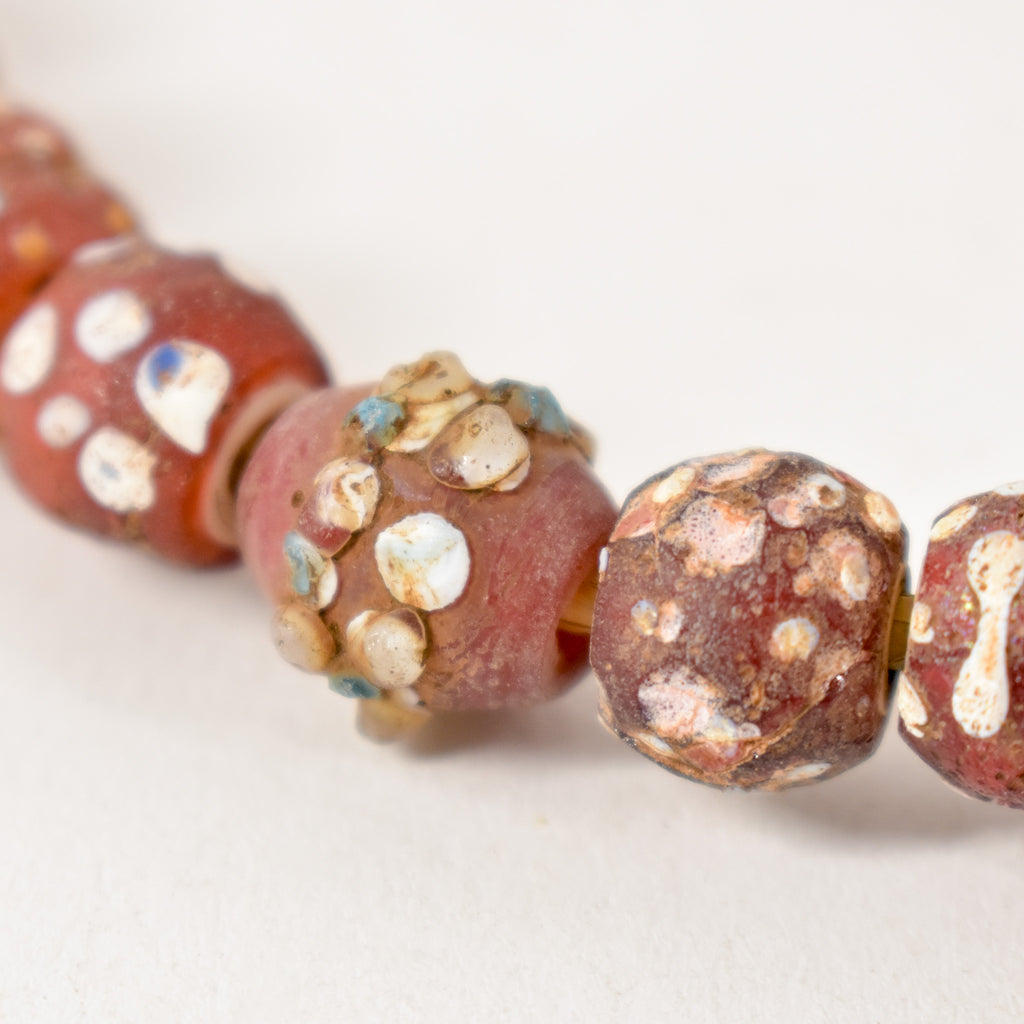 Mixed Skunk Floral Rasied Dot Venetian Red Trade Beads