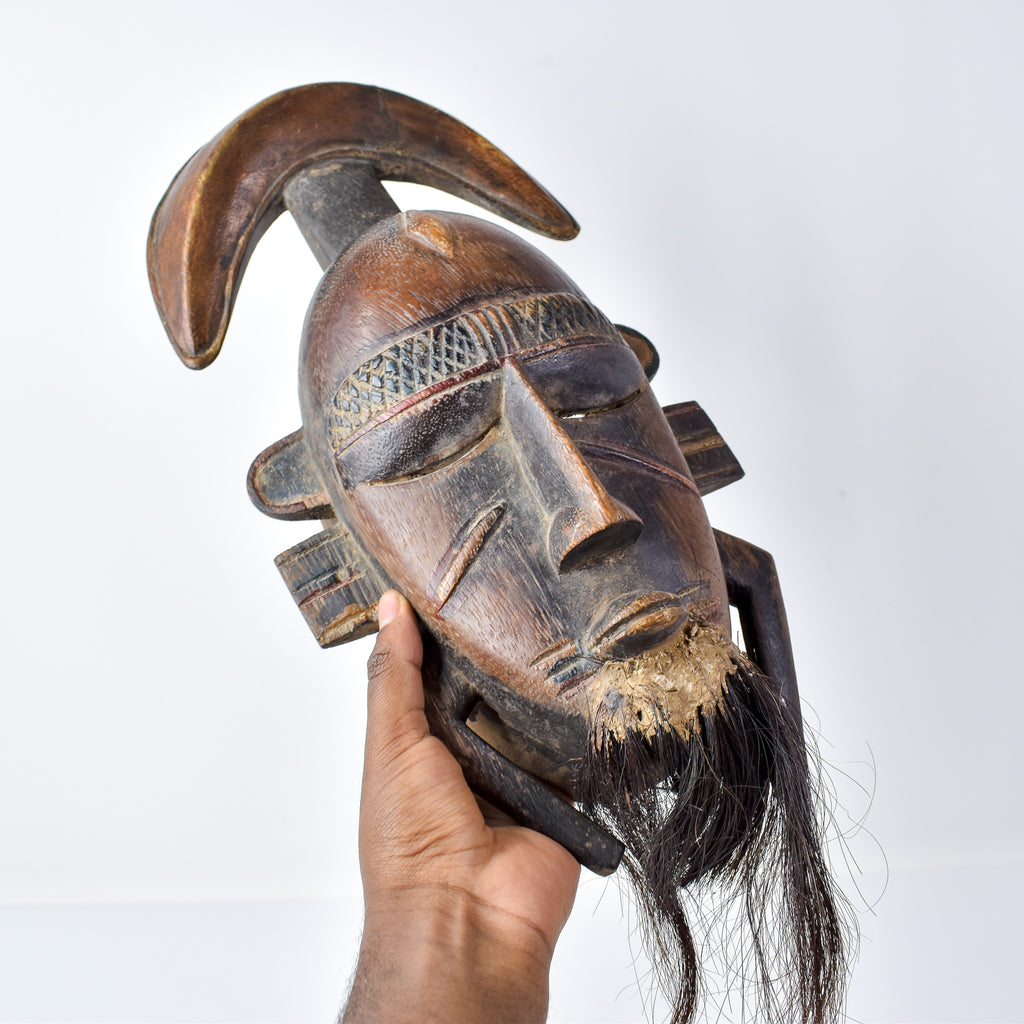 Djimini Ligbi Do Society Mask on Custom Stand Côte d'Ivoire