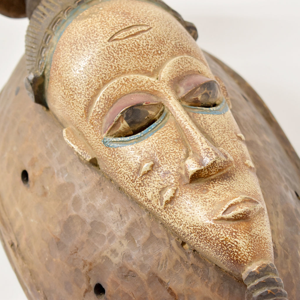 Guro Figural Portrait Mask With Bird Côte d'Ivoire