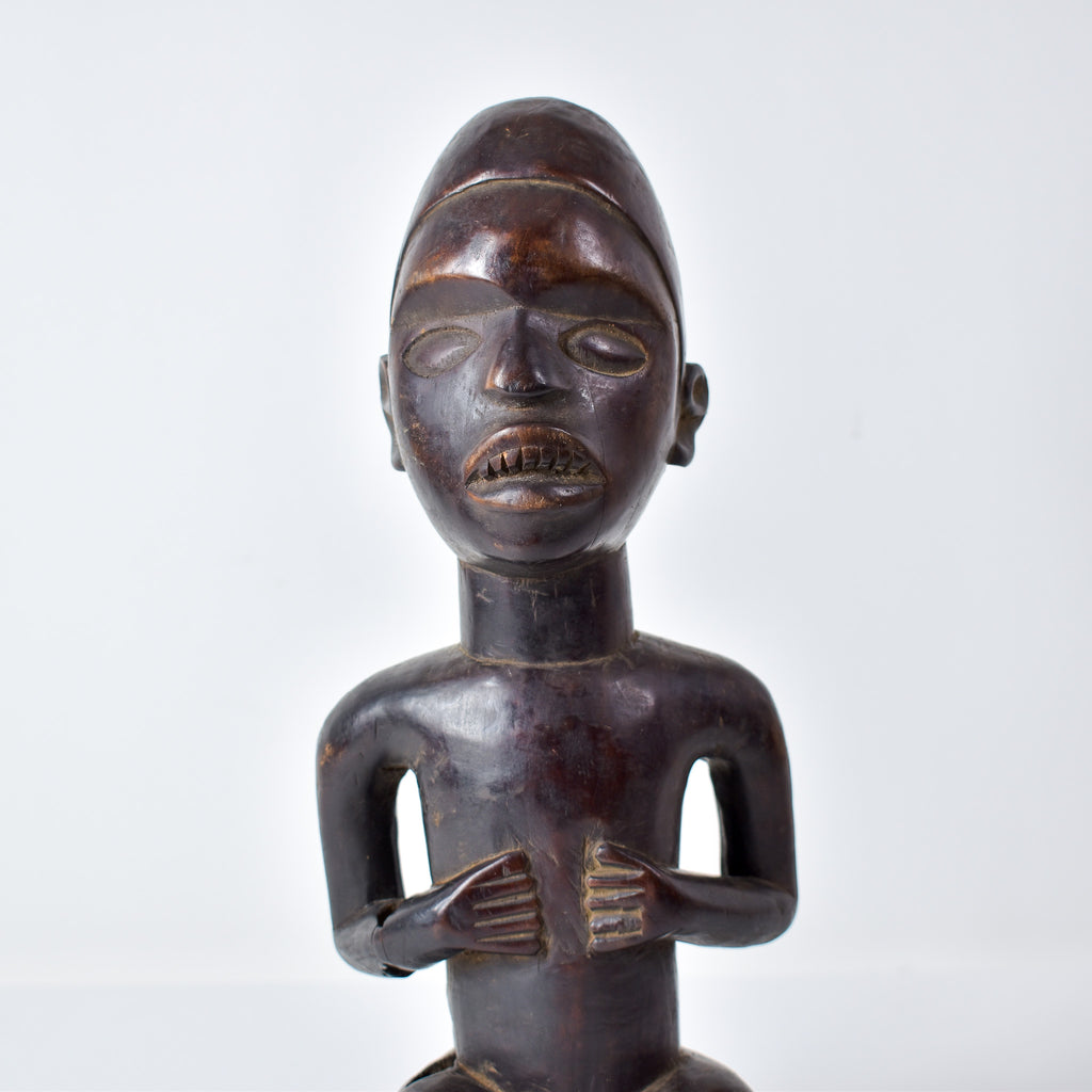 Baule Seated Wood Figure Côte d'Ivoire
