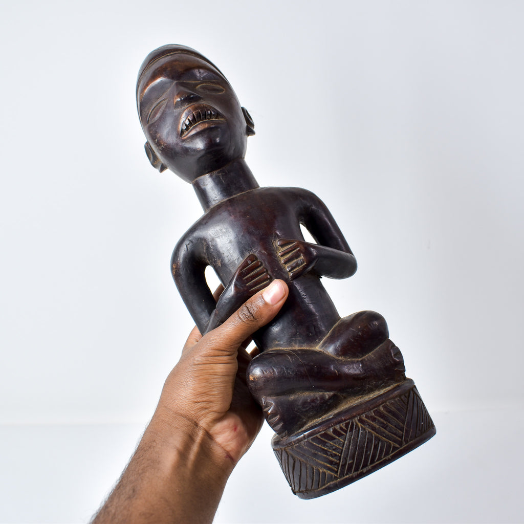 Baule Seated Wood Figure Côte d'Ivoire