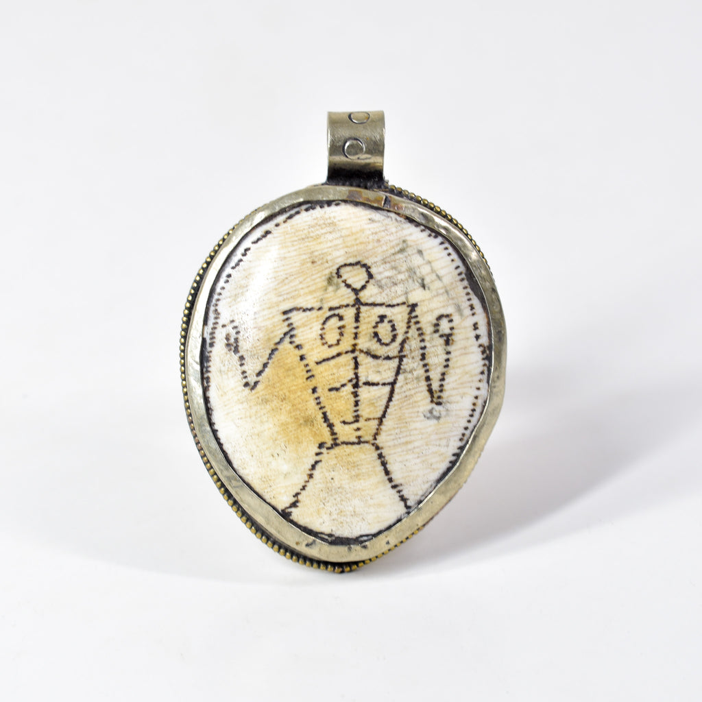 Tibetan Shell Repoussé Pendant