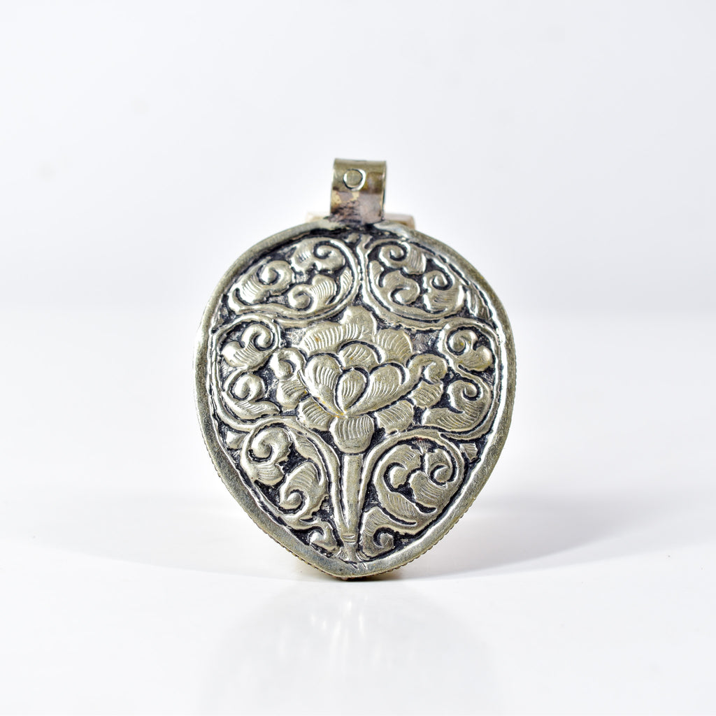 Tibetan Shell Repoussé Pendant