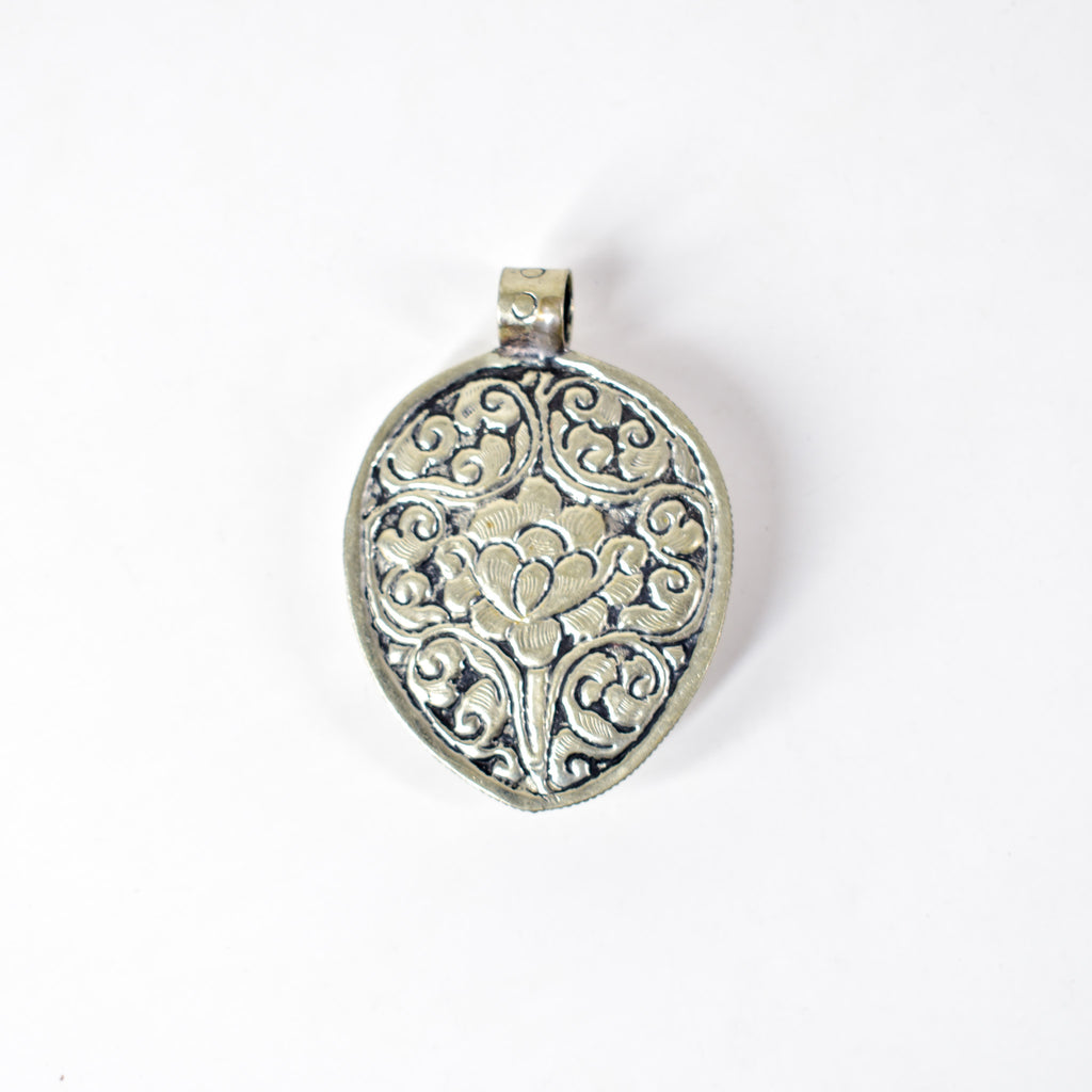 Tibetan Shell Repoussé Pendant