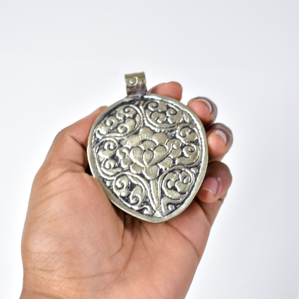 Tibetan Shell Repoussé Pendant