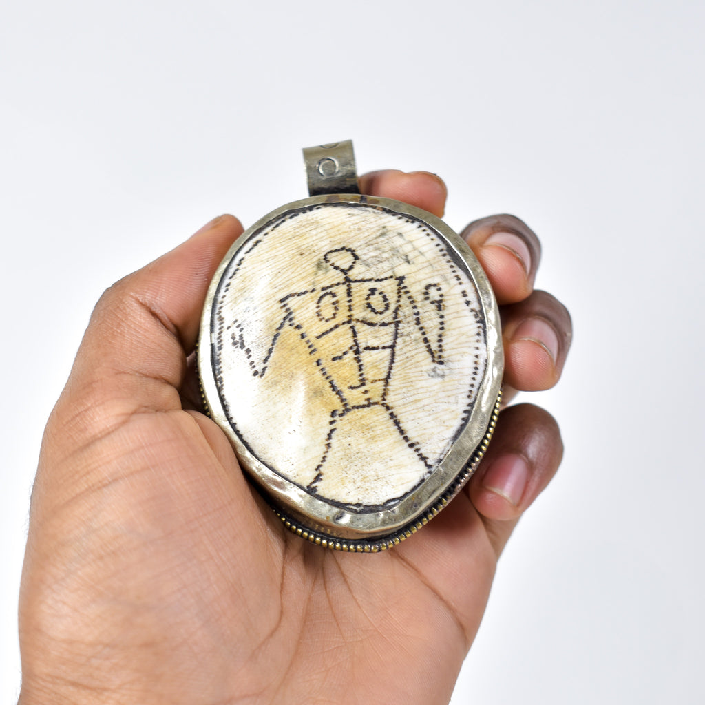 Tibetan Shell Repoussé Pendant