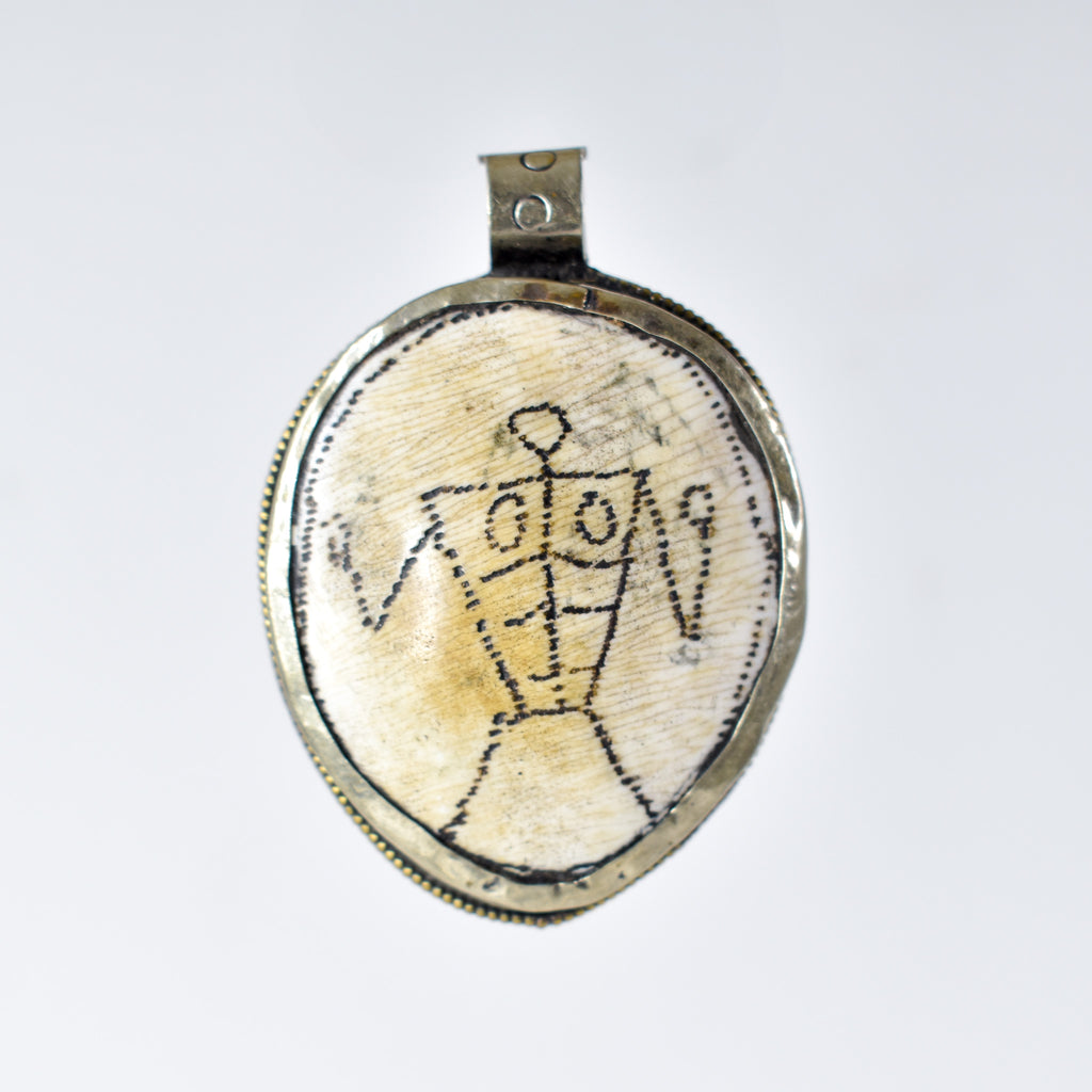 Tibetan Shell Repoussé Pendant