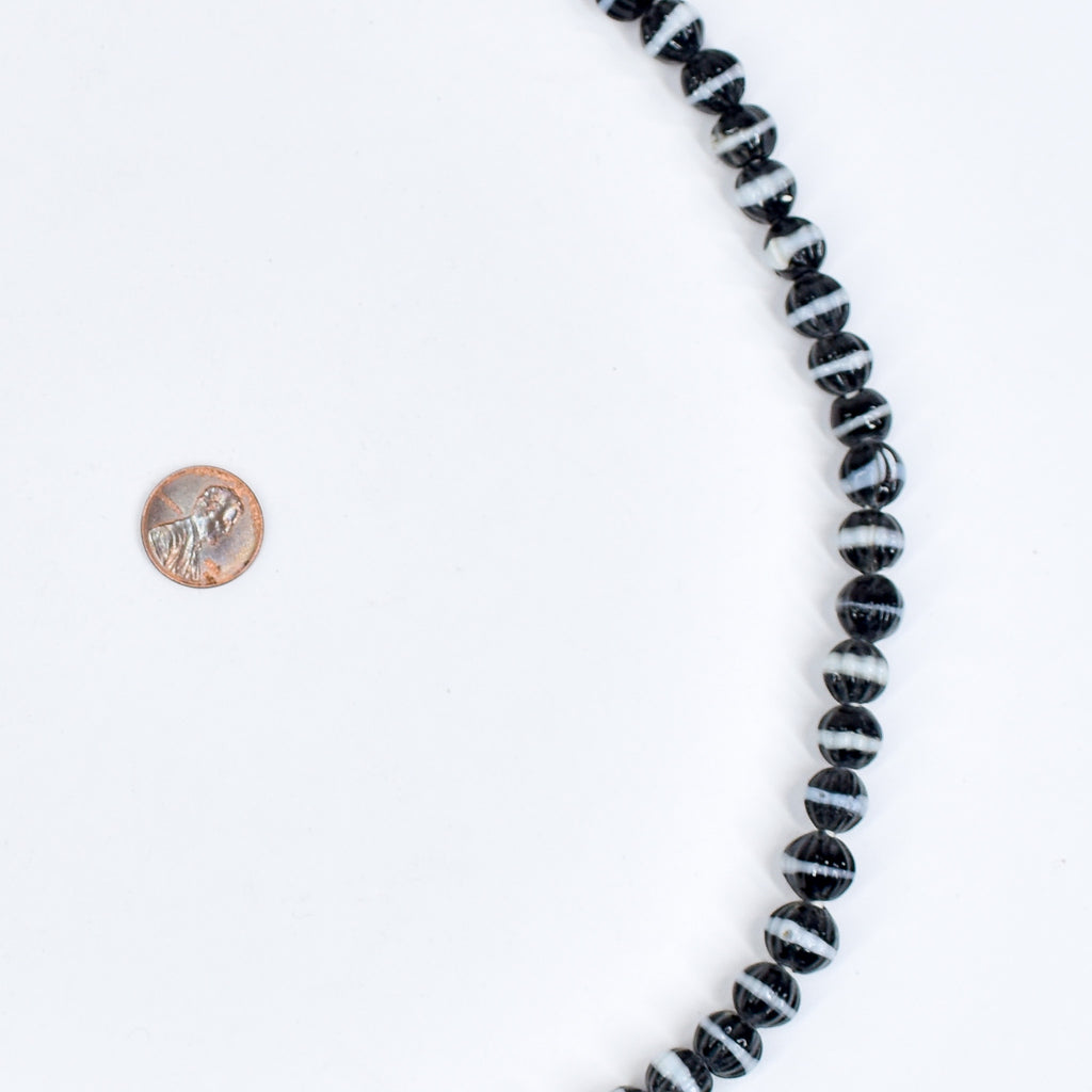 Dog Tooth Ruffle Black Trade Beads