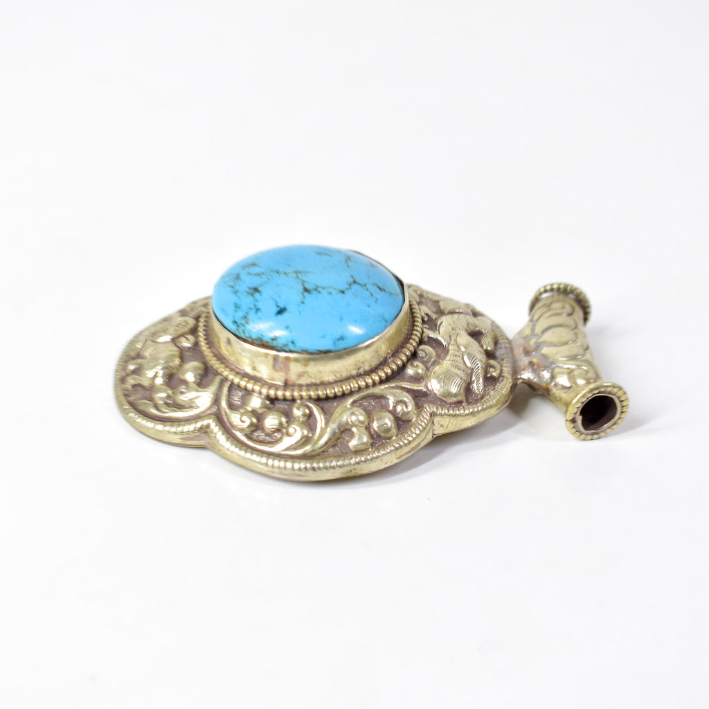 Tibetan Turquoise Colored Repoussé Pendant