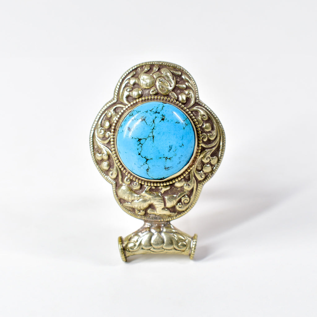 Tibetan Turquoise Colored Repoussé Pendant