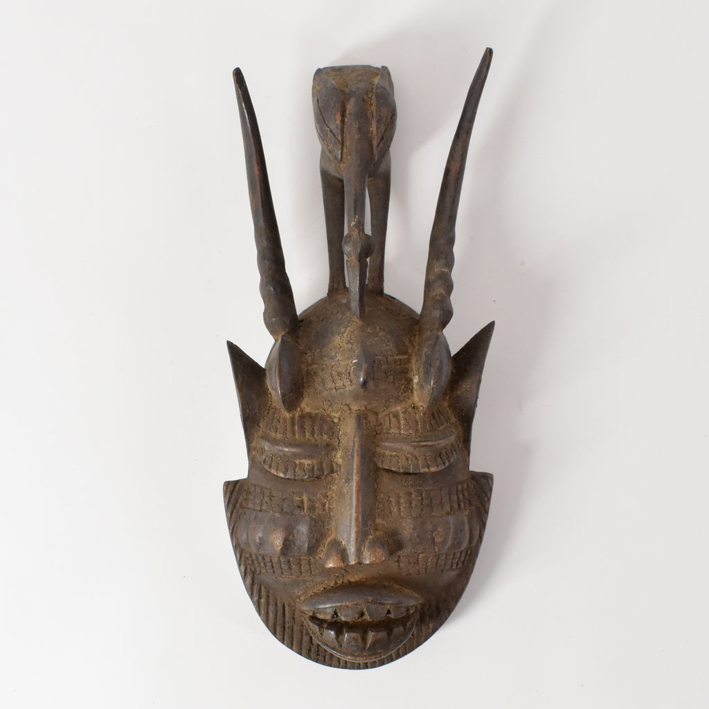 Senufo Kpelie Mask with Bird Côte d'Ivoire