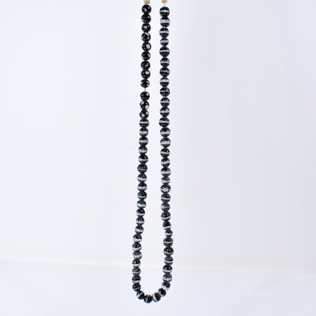 Dogtooth Ruffle and Bohemian Skunk Trade Beads