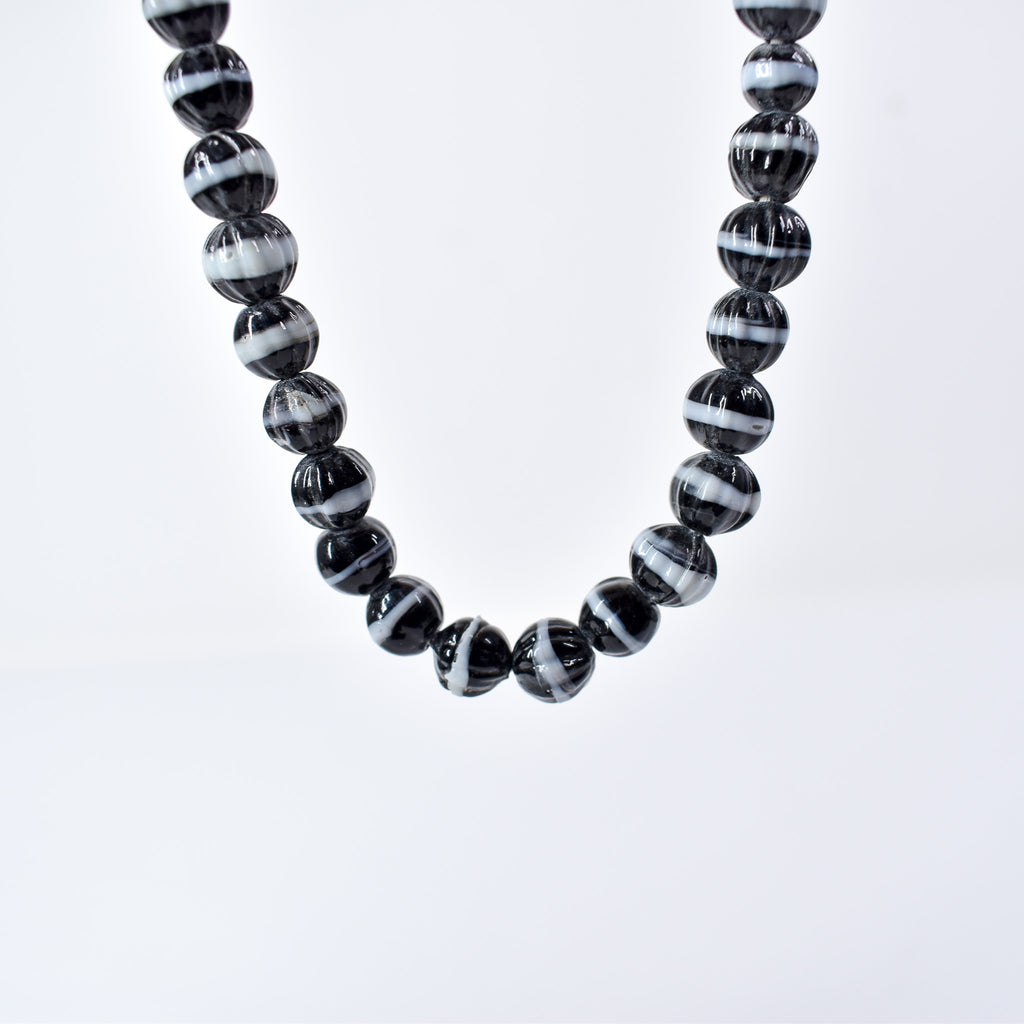 Dogtooth Ruffle and Bohemian Skunk Trade Beads