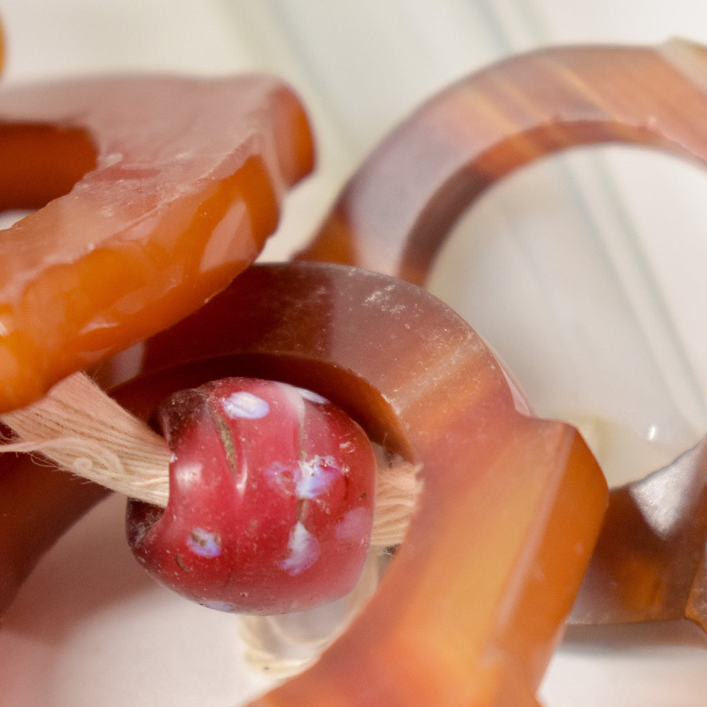 Carnelian Talhakimt Pendants and Skunk Trade Beads