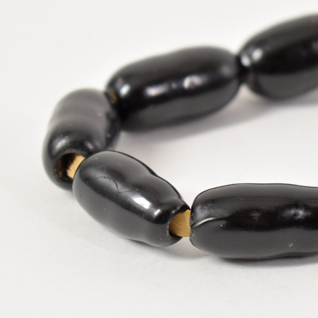 Amoeba Black Trade Beads 32 Inch
