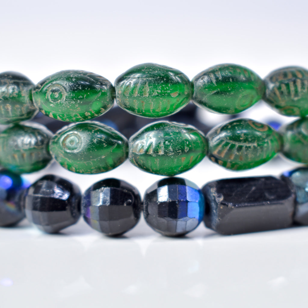Iridescent Faceted Graduated Bohemian Black Trade Beads