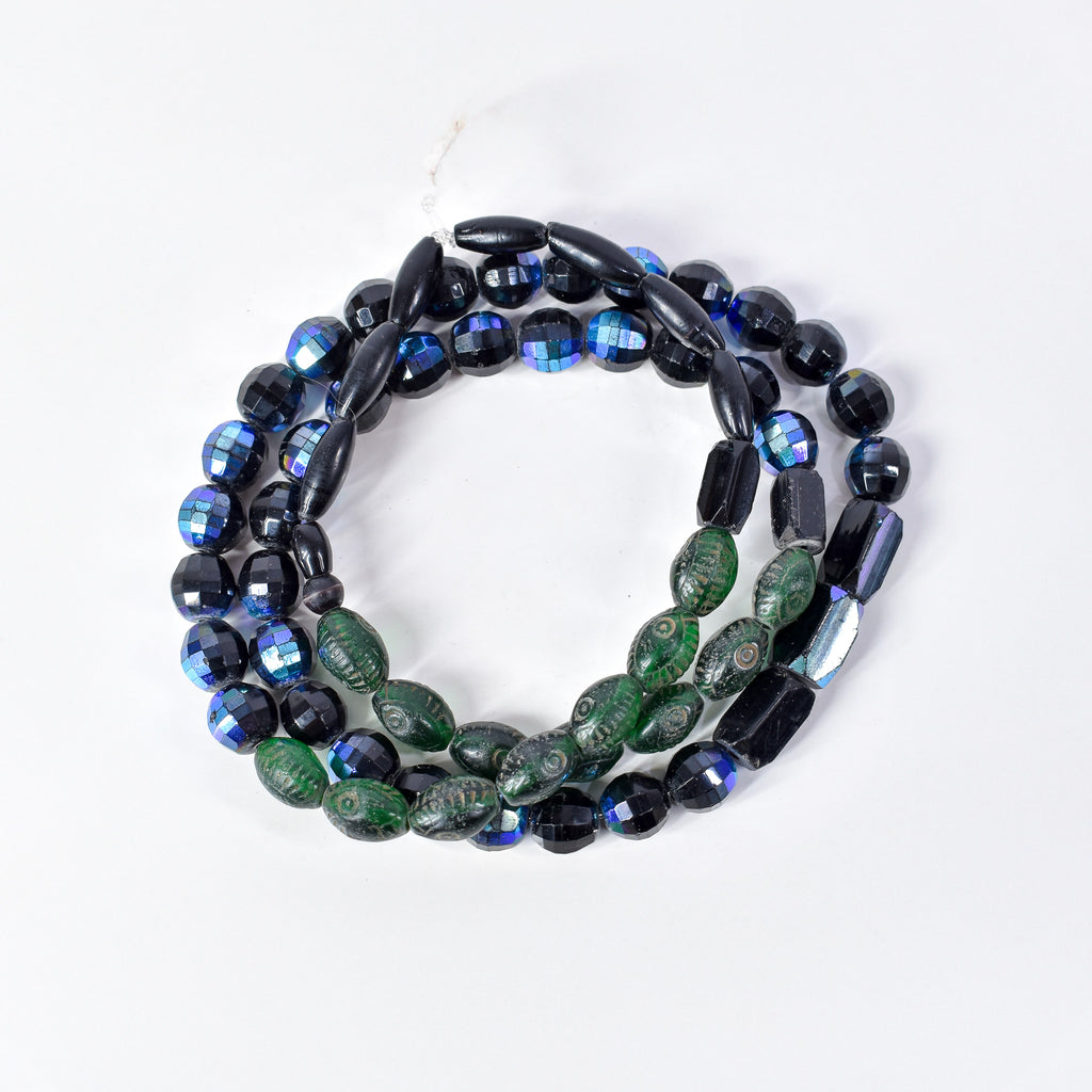 Iridescent Faceted Graduated Bohemian Black Trade Beads
