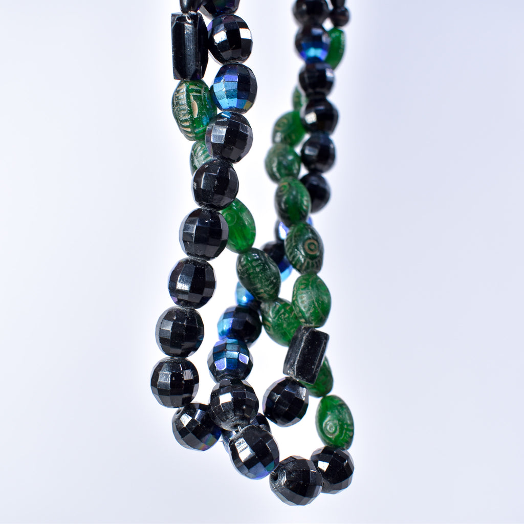 Iridescent Faceted Graduated Bohemian Black Trade Beads