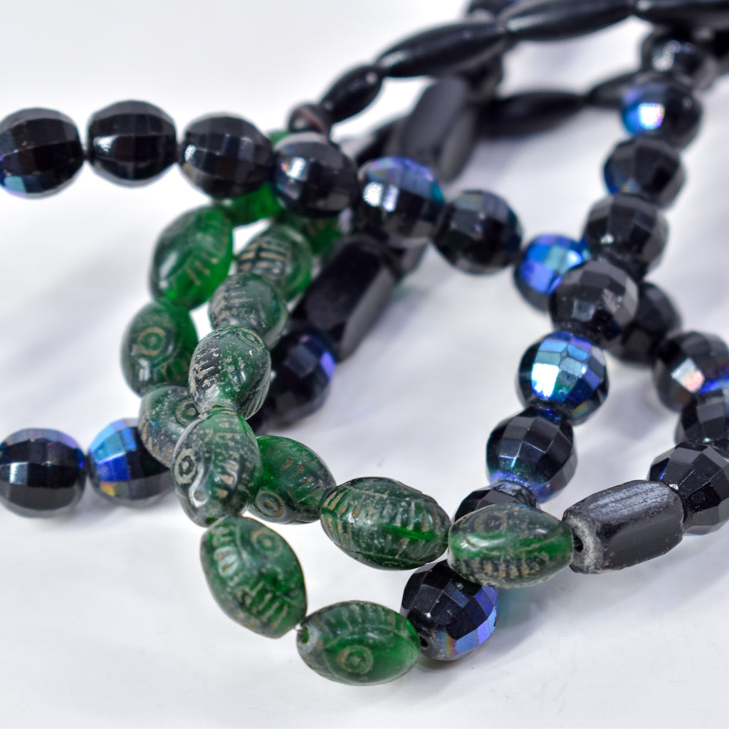 Iridescent Faceted Graduated Bohemian Black Trade Beads
