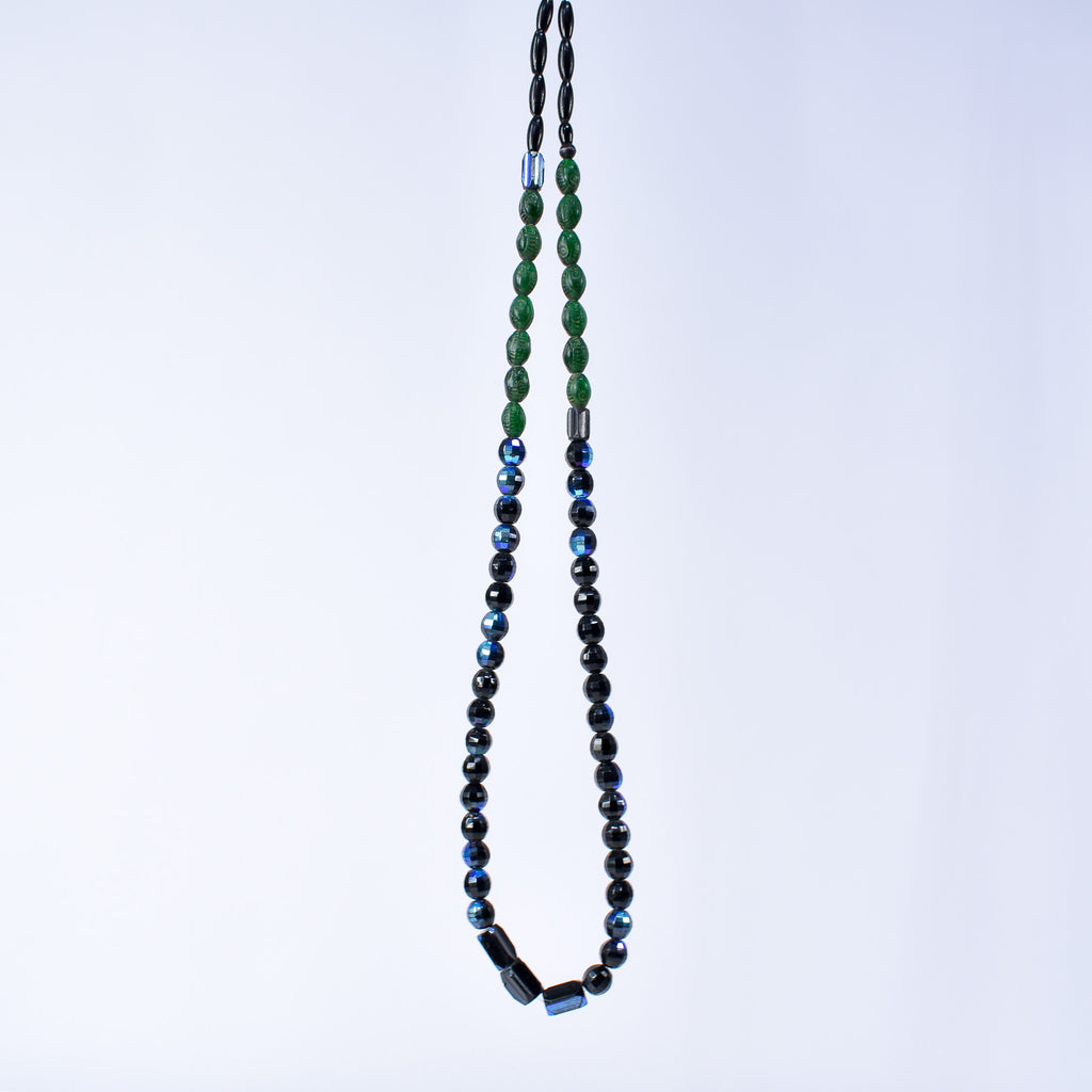 Iridescent Faceted Graduated Bohemian Black Trade Beads