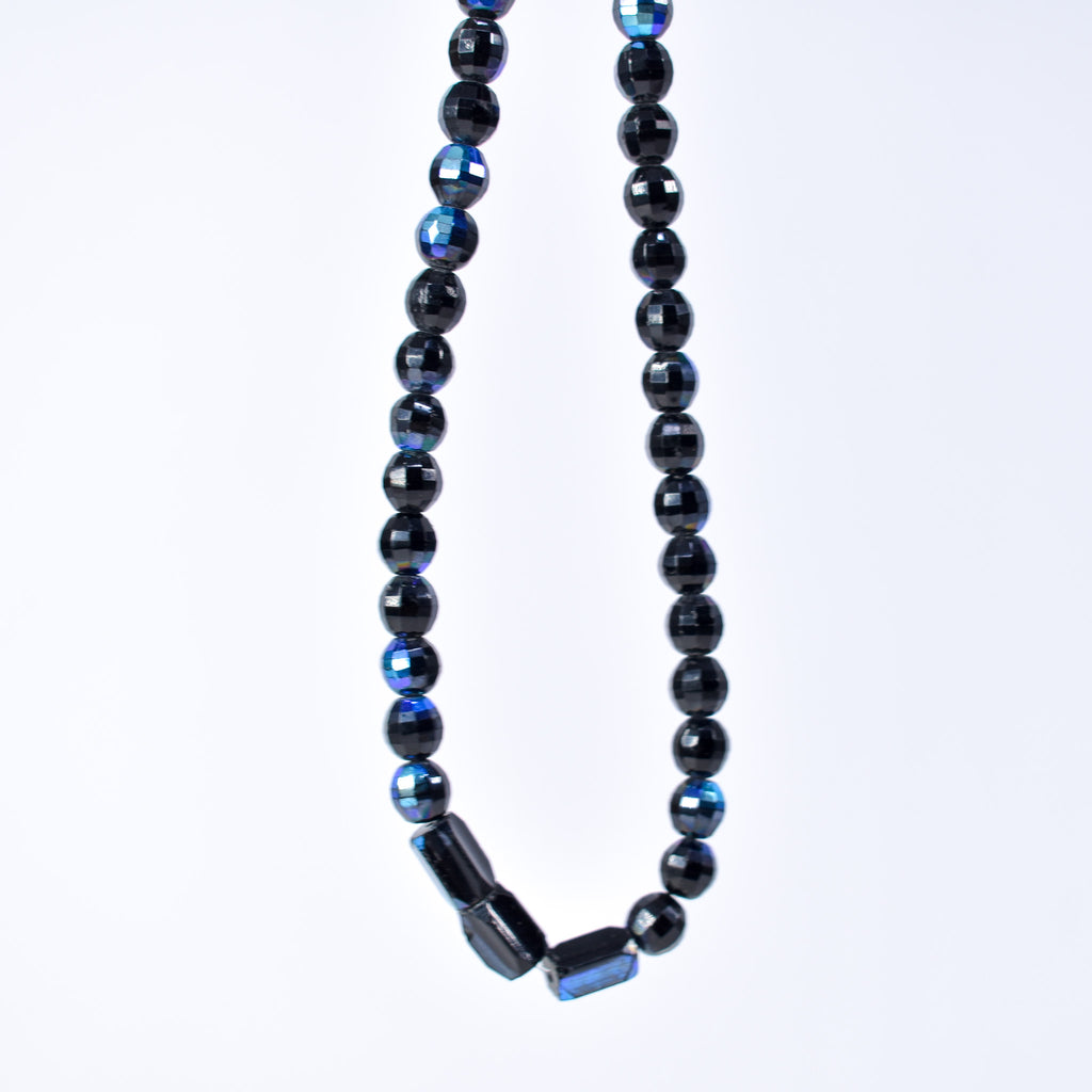 Iridescent Faceted Graduated Bohemian Black Trade Beads
