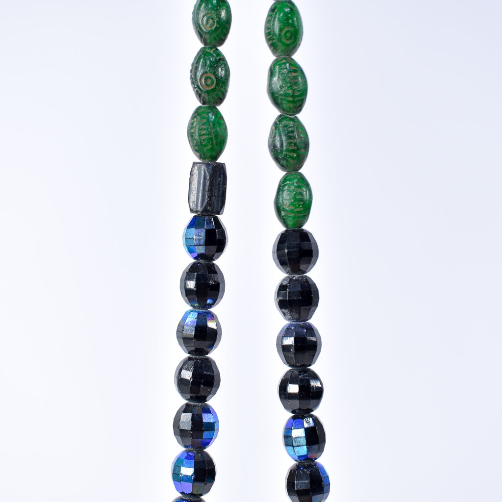 Iridescent Faceted Graduated Bohemian Black Trade Beads