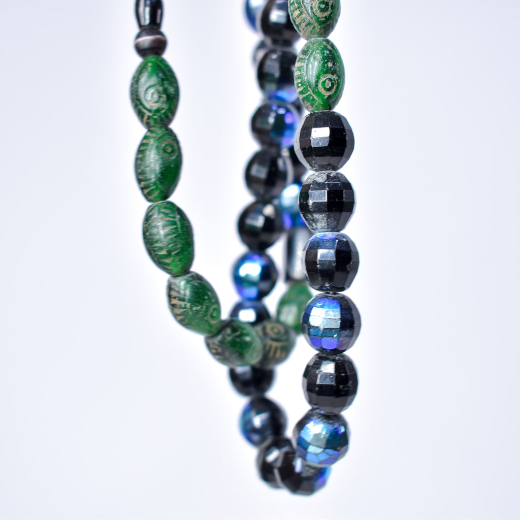Iridescent Faceted Graduated Bohemian Black Trade Beads