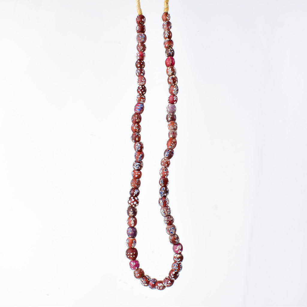 Mixed Whiteheart Skunk Floral Dot Venetian Red Trade Beads