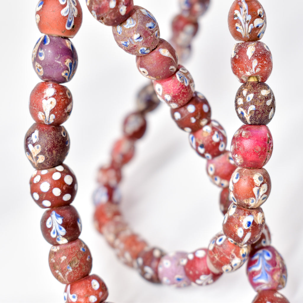 Mixed Whiteheart Skunk Floral Dot Venetian Red Trade Beads