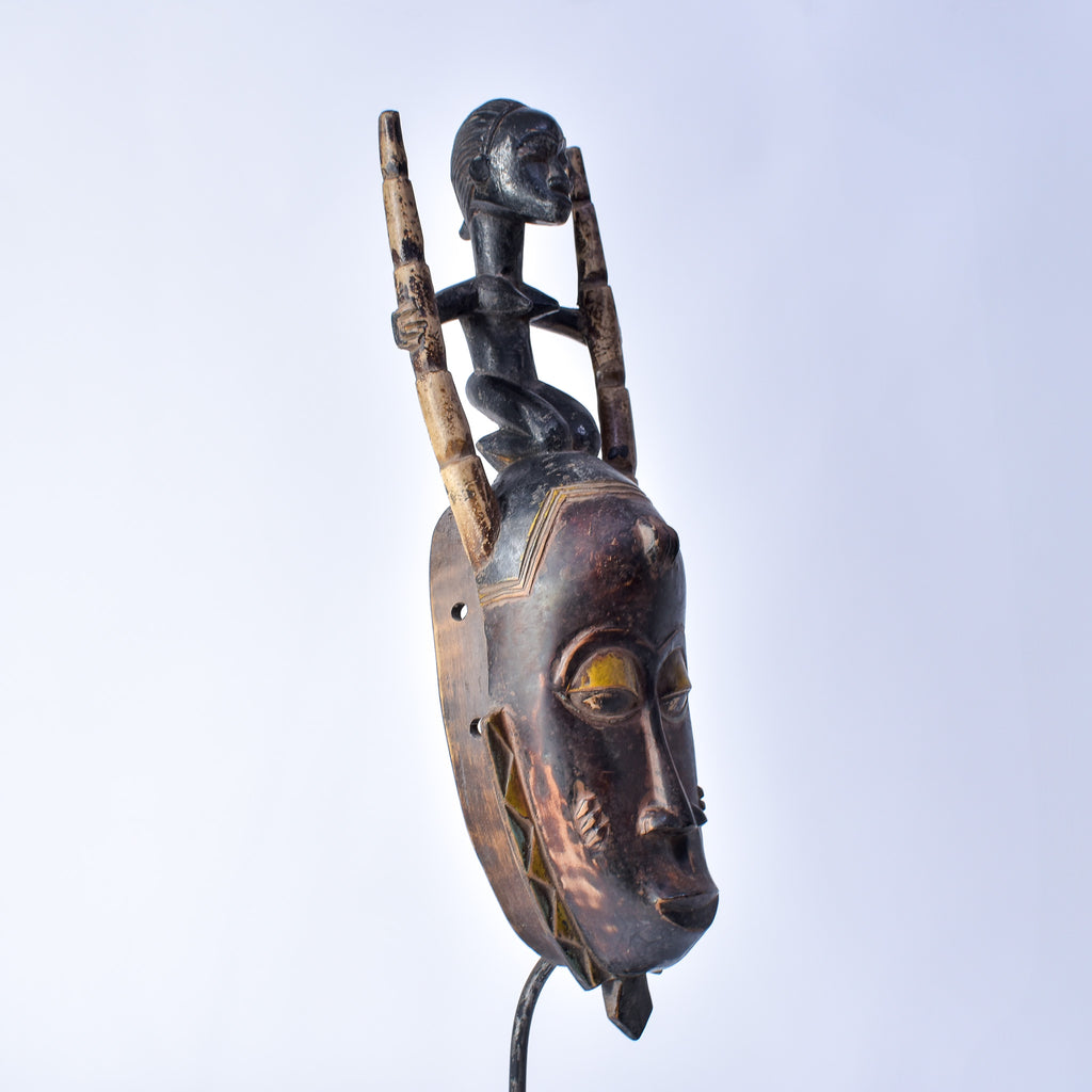 Guro House Mask with Figure Côte d'Ivoire