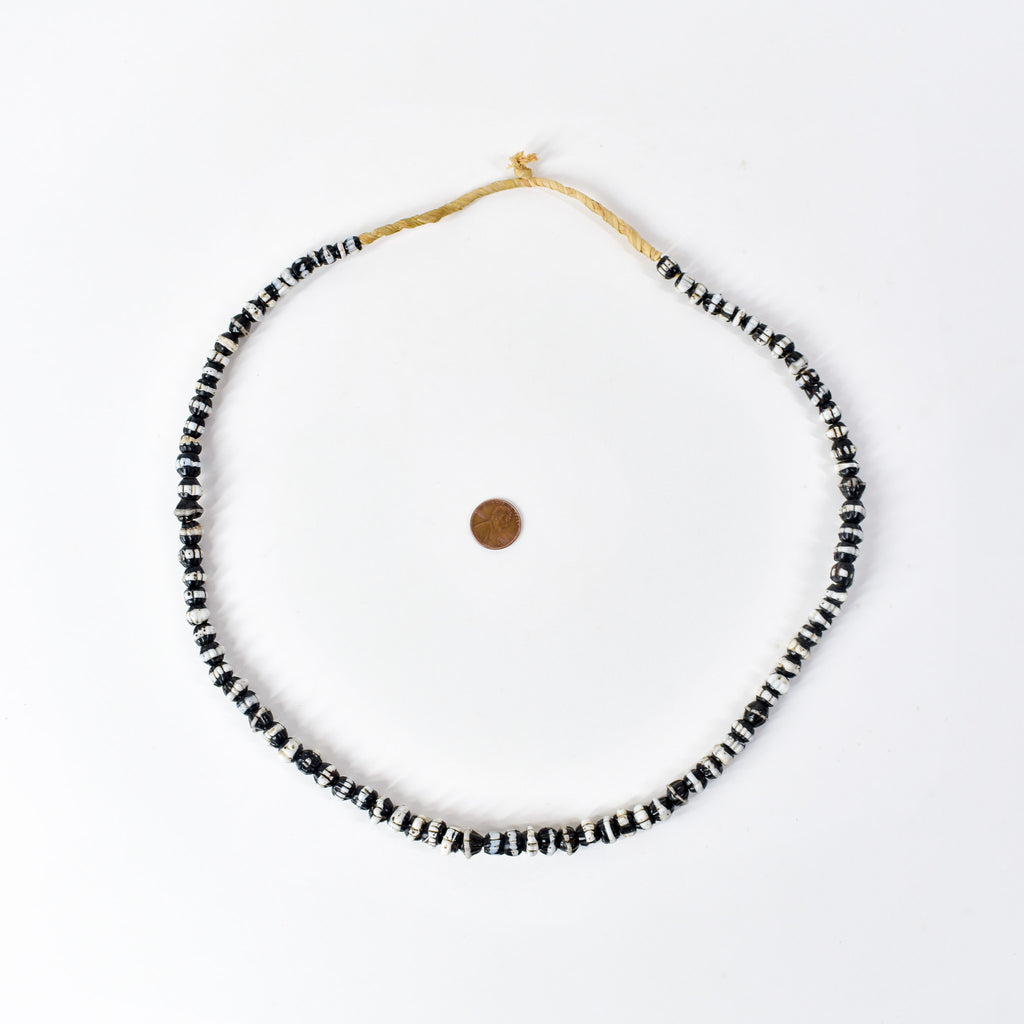 Dog Tooth Ruffle Black Trade Beads