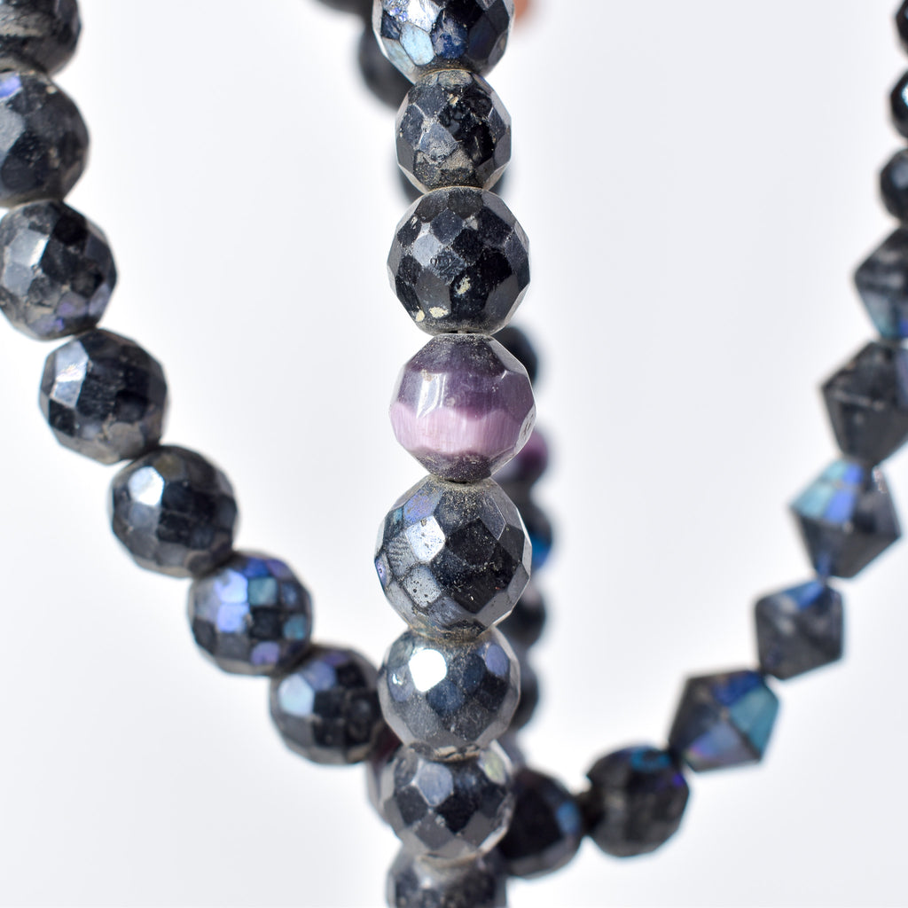 Iridescent Faceted Graduated Bohemian Black Trade Beads