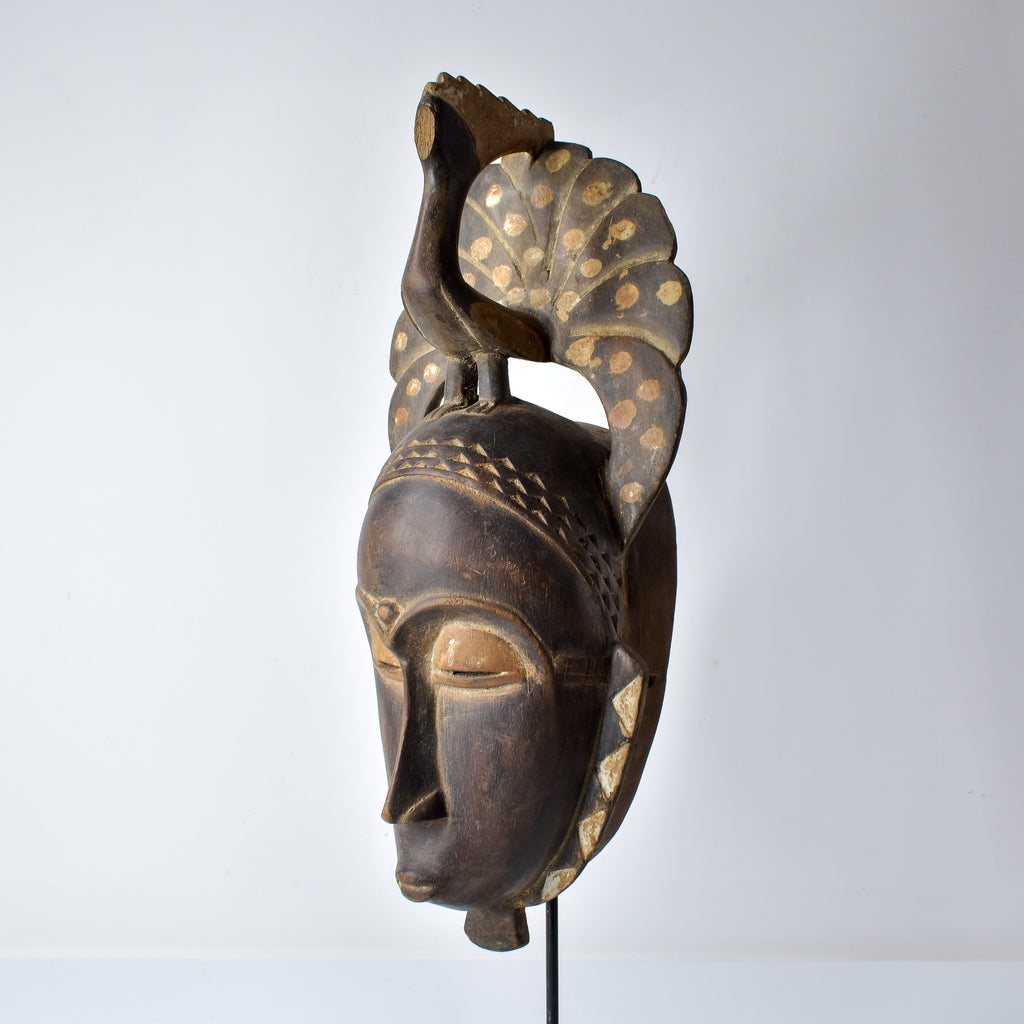 Guro Figural Mask with Peacock Côte d'Ivoire