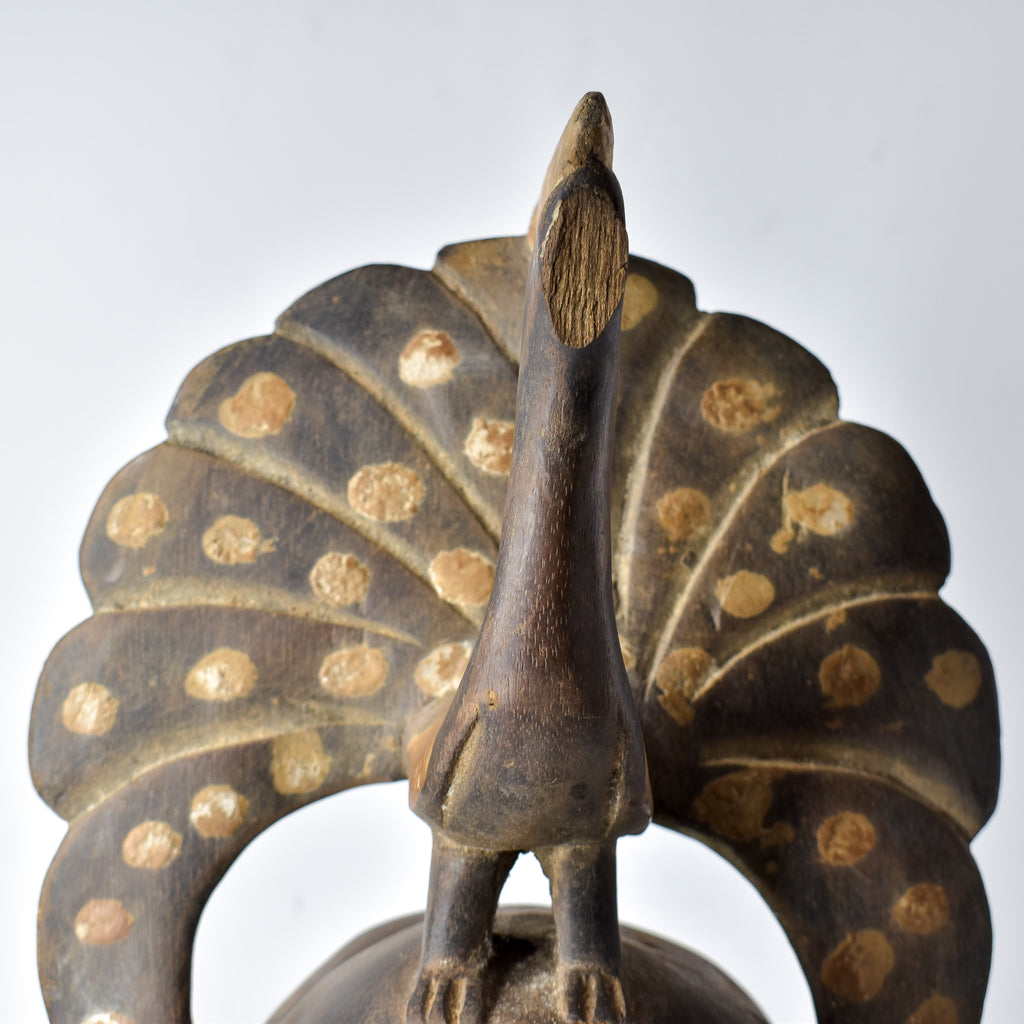 Guro Figural Mask with Peacock Côte d'Ivoire
