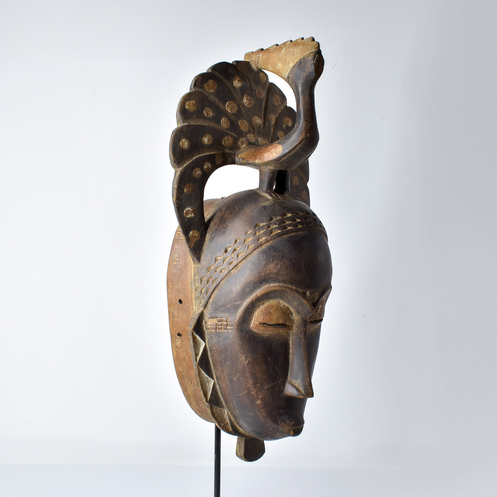 Guro Figural Mask with Peacock Côte d'Ivoire