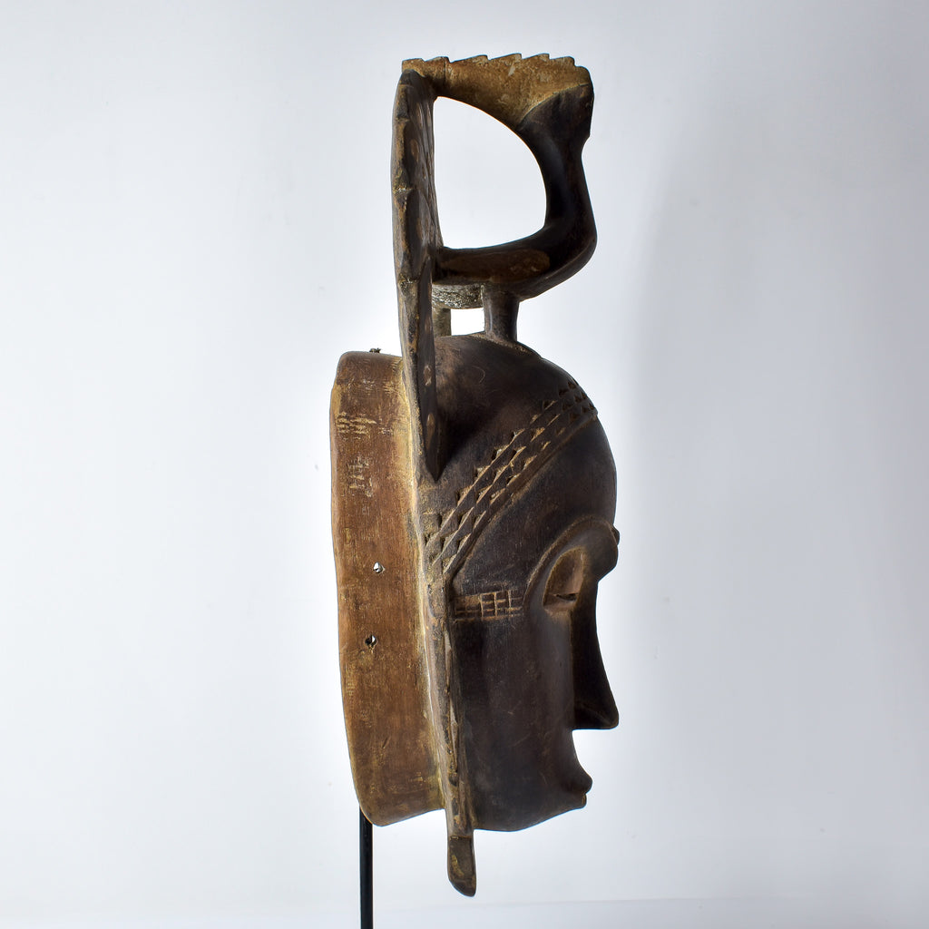 Guro Figural Mask with Peacock Côte d'Ivoire