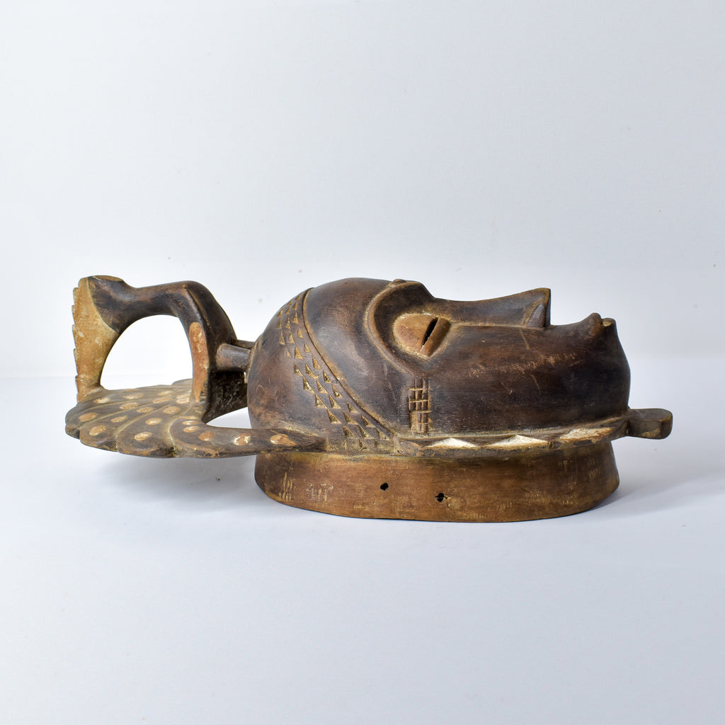 Guro Figural Mask with Peacock Côte d'Ivoire