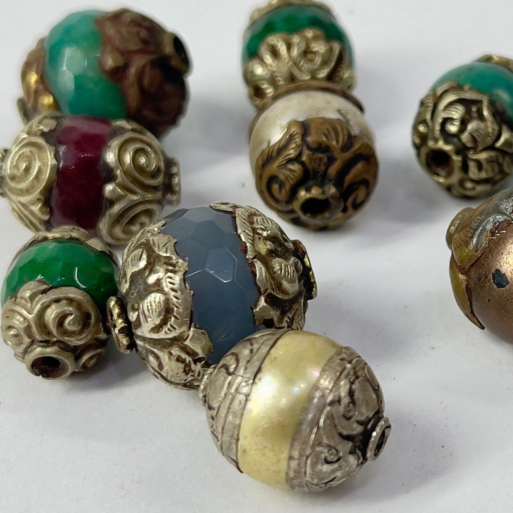 11 Loose Tibetan Repoussé Beads