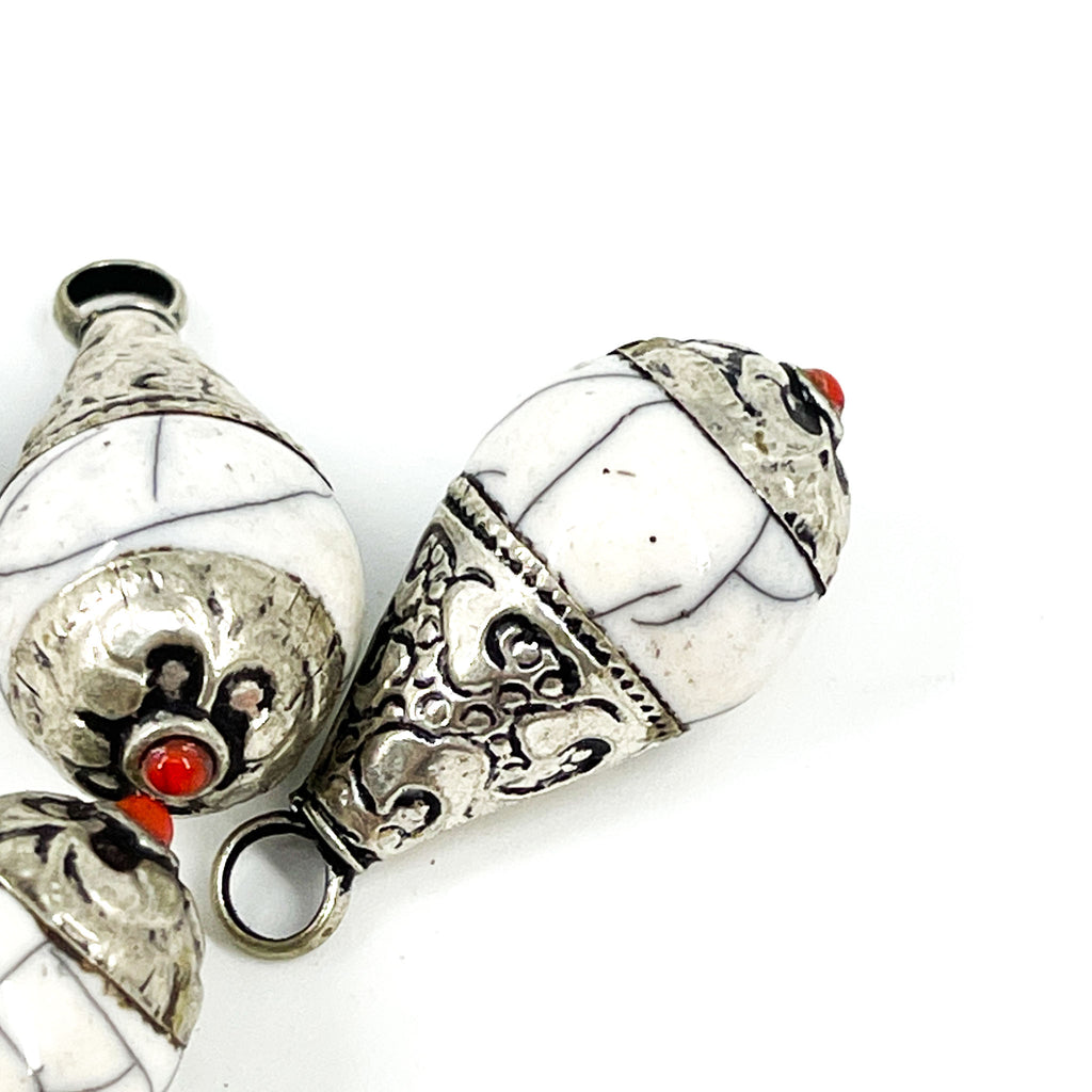 4 Tibetan Pendants White Crackle with Silver Repoussé