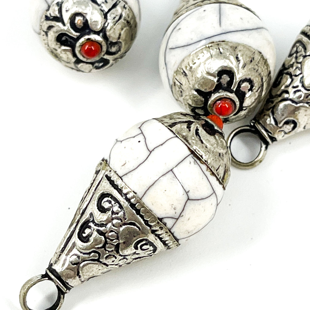 4 Tibetan Pendants White Crackle with Silver Repoussé