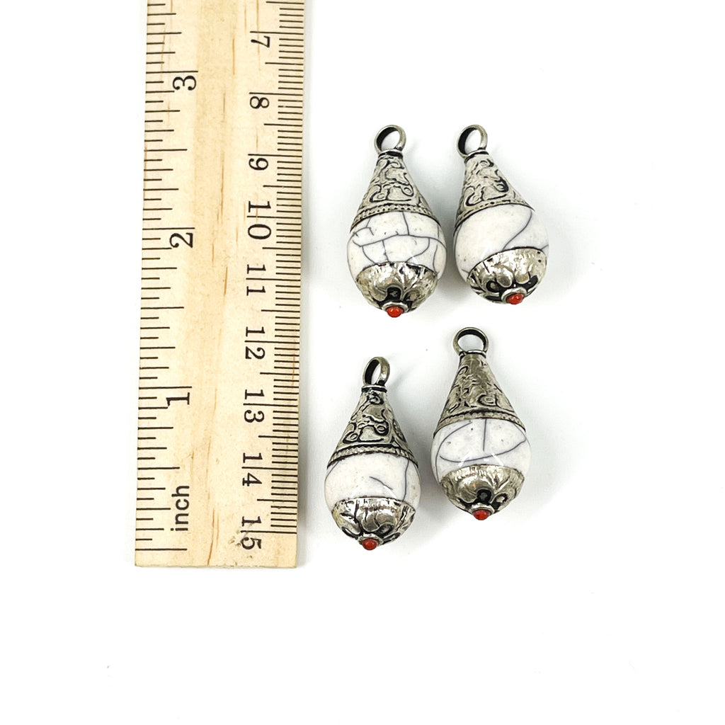 4 Tibetan Pendants White Crackle with Silver Repoussé