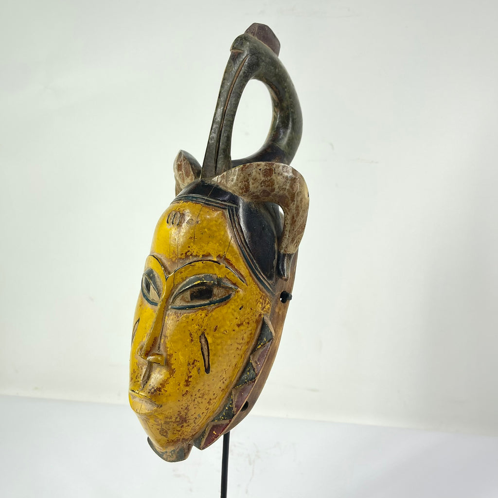 Guro House Mask with Figure Côte d'Ivoire
