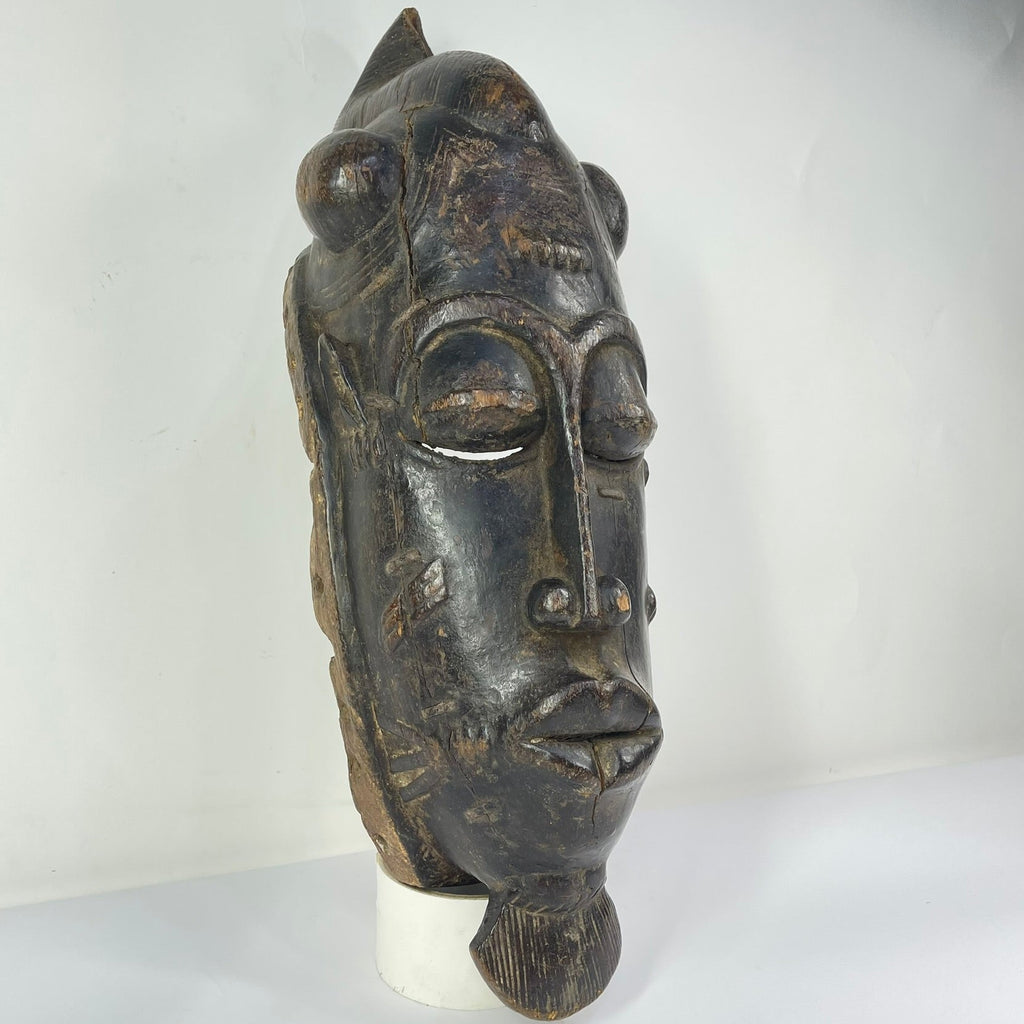 Baule Portrait Mask with Indigenous Repairs Côte d'Ivoire
