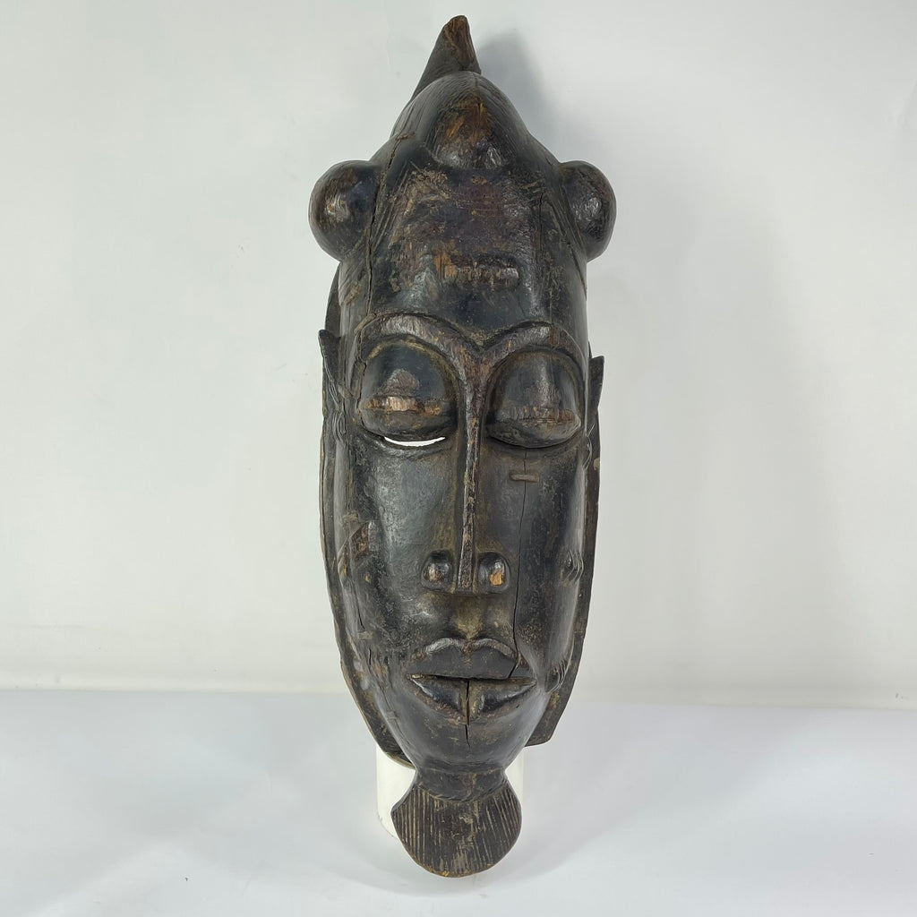 Baule Portrait Mask with Indigenous Repairs Côte d'Ivoire