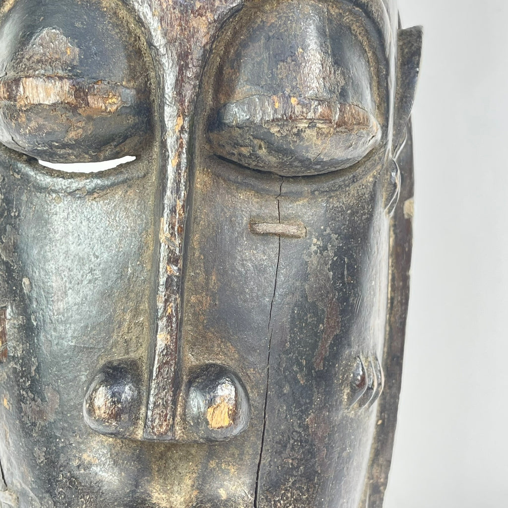 Baule Portrait Mask with Indigenous Repairs Côte d'Ivoire