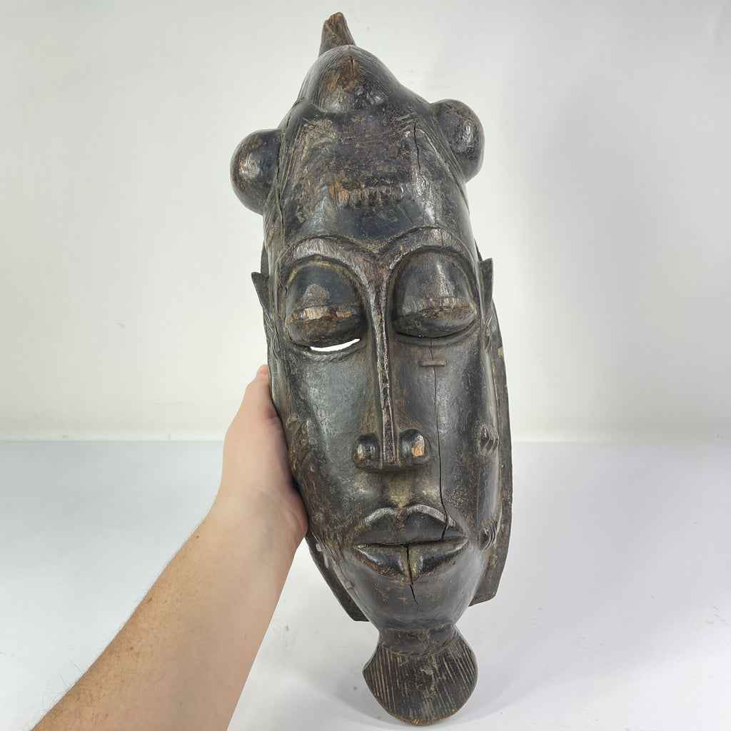 Baule Portrait Mask with Indigenous Repairs Côte d'Ivoire