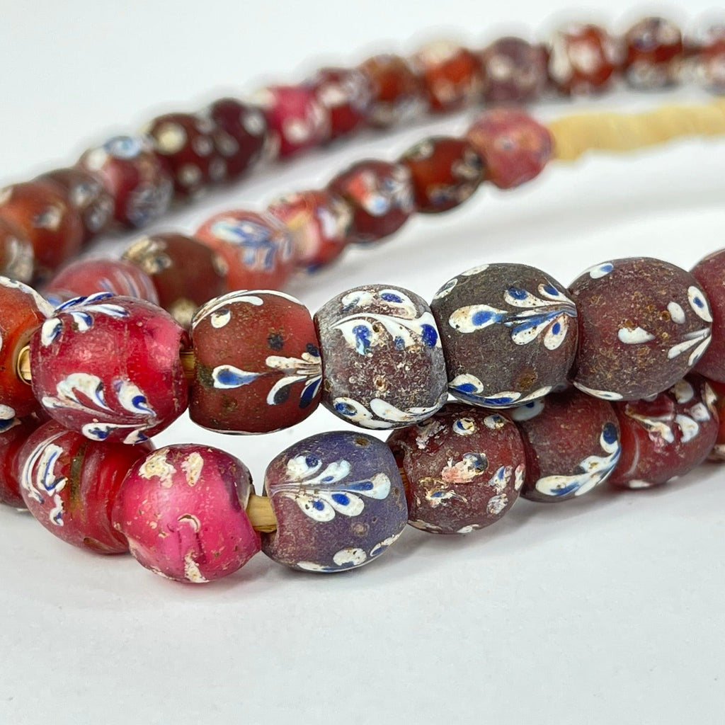 Plum Red Fancy Floral and Skunk Venetian Trade Beads